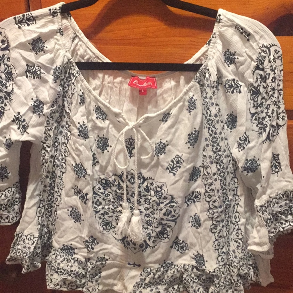 White shirt with blue pattern